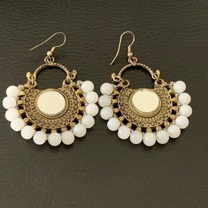 White mirror and oxidized earrings